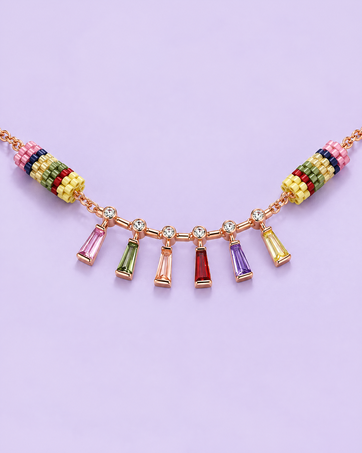 Rainbow Baguette Charm Bracelet on lavender background
