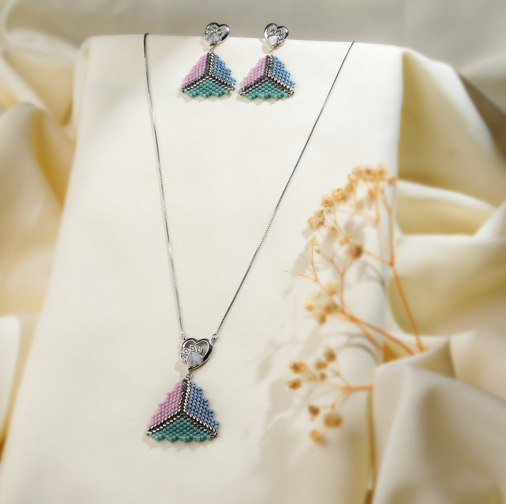 Silver-tone necklace and earrings with pink, blue and turquoise beaded triangle drops
